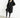 Manteau trench noir oversize porté avec sac à main