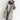 Femme portant le manteau trench Elina beige avec capuche