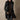 Femme portant le trench noir Eloise™ en intérieur, style motard moderne