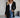 Gilet noir femme boutonné porté avec jean
