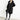 Manteau trench noir oversize porté avec sac à main